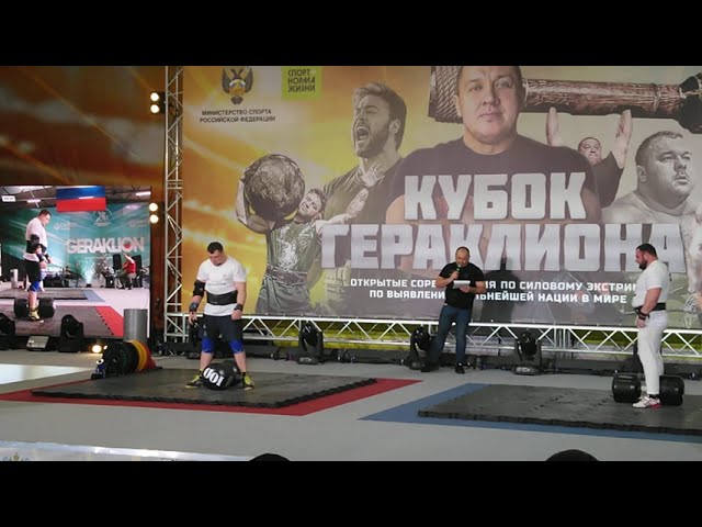 Максим Дворецкий и Юрий Кузьмин . Подъём гантели 100 кг.