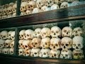 Pile of Skulls and Bones at The Killing Fields of Mass Graves in Phnom Penh Cambodia