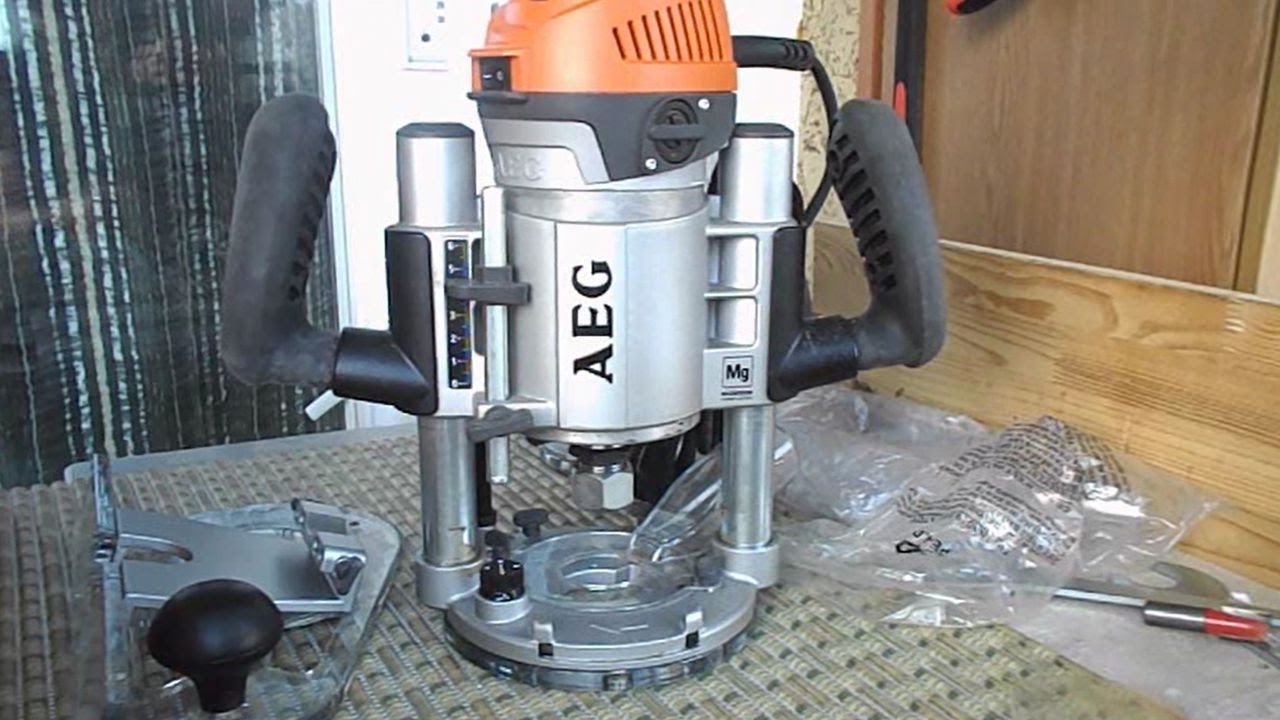 Фрезер AEG MF 1400 KE  1400Вт 10000-23000об/мин макс.ход 64мм диам.хв.8-12мм