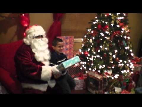 Santa Claus appears at our Christmas Eve Party