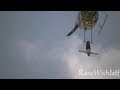 SUPERSTAR BELLO NOCK TRAPEZE ACT 500 FEET IN THE AIR UNDER A HELICOPTER