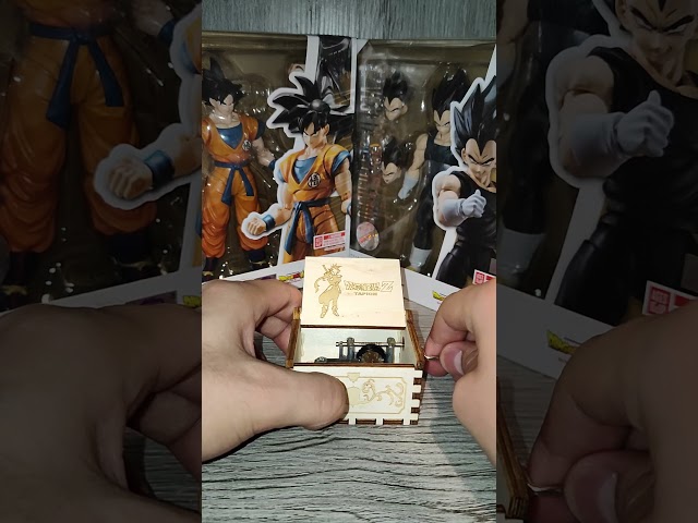 Vídeo relacionado con Cuzit Caja Musical de Madera con diseño de Pelota de DBZ, diseño Antiguo