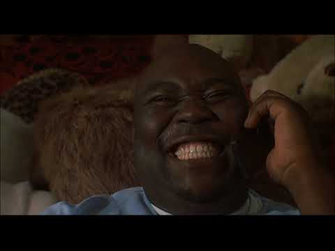 Trailer frame: Brian Hooks ducking danger, cut to title card