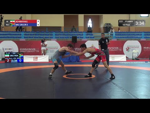 1/2 FS - 65 kg: S. ADHAM KHALIL (IRI) v. X. MAC GREGOR (RSA)