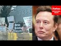 Anti-Elon Musk Protesters Gather Outside The Tesla Dealership In Cherry Hill, New Jersey