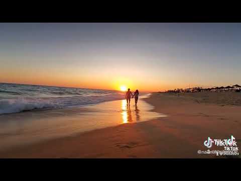 Couple romance in sea beach,Portugal.