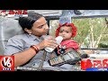 Lady Bus Conductor Issues Tickets By Carrying Her Baby Teenmaar News V6 News