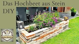 Blumen Hochbeet aus Stein . Клумба из камней для цветов .Flower bed made of ston