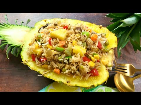 Pineapple Mushroom Fried Rice Served In A Pineapple Bowl