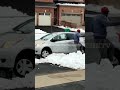 Video 'Porch Pirate Fails Stealing A Package & Gets His Car Stuck In A Snow'
