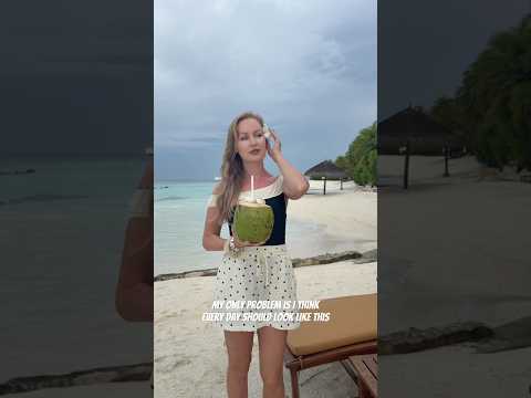 — coconut in hand, ocean breeze, and a perfectly romantic beach look 🥥👌🏻