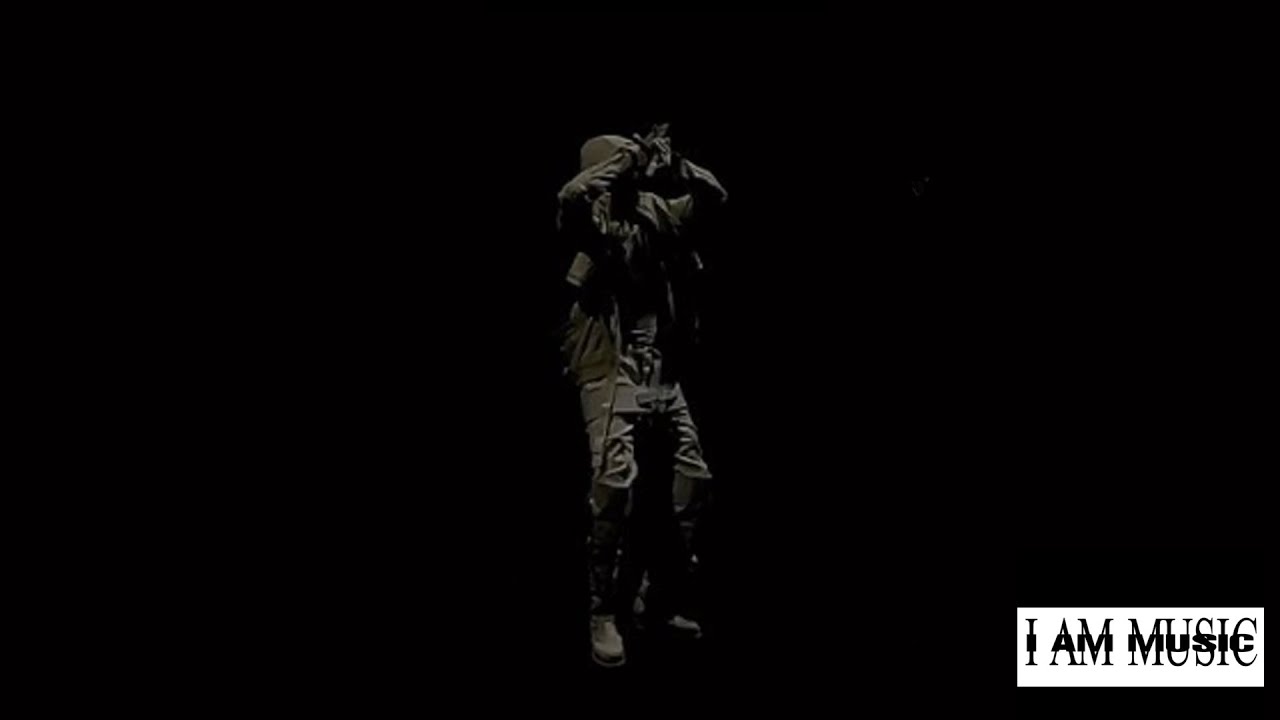 Playboi Carti performing H00DBYAIR in the music video