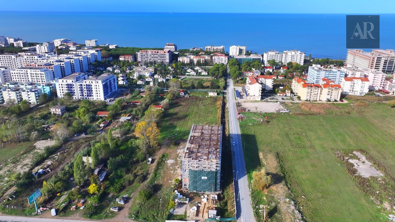 Drone shot of Liam Residence complex in Golem, Albania - modern apartments 350m from the sea