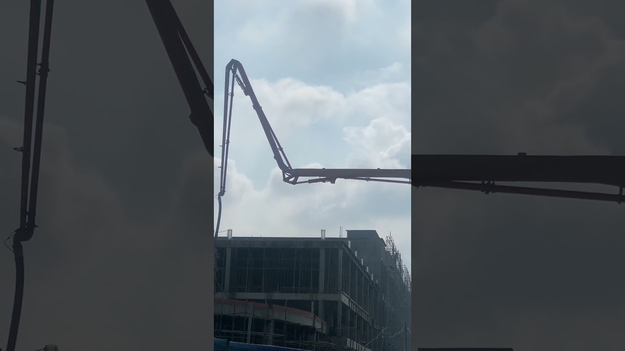 Epic Concrete Boom Pump Action on High-Rise Construction