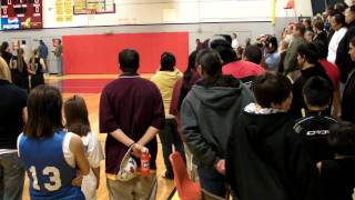 carina vasquez (minthorn) native american sings national anthem at nixyaawii home game!