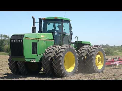 JOHN DEERE 8870 Tractor Working with a 50ft Harrow