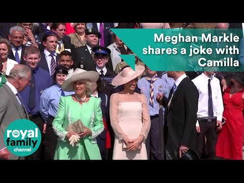 Meghan shares a joke with Camilla at Prince Charle's 70th birthday at Buckingham Palace