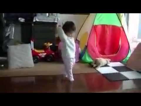 baby spins and walks and dances on tiptoes.