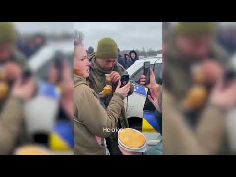 RUSSIAN SOLDIER SURRENDERS IN TEARS