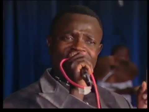 Allan Chimbetu on stage with his late brothers, Simon & Brian Chimbetu - Song: Ndarangarira Gamba