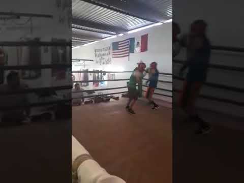 Abraham busani.camisa azul,