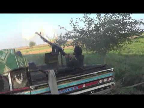 التصدي للطران الحربي برشاش الدوشكا من قبل كتيبة أسود الجزيرة والفرات في ريف دير الزور