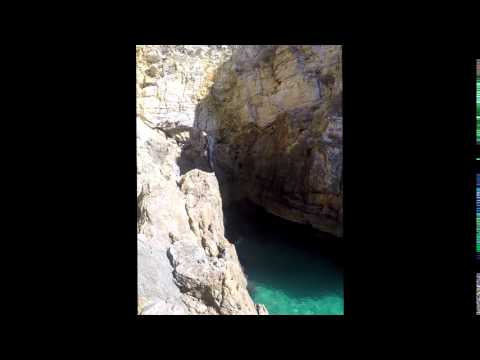 Double backflip from a rock in Portugal