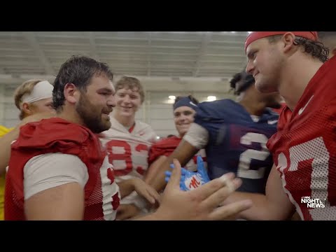 Good News: College football players surprised with scholarships