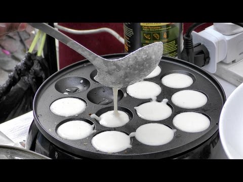 London Street Food from India. Cooking Rice Pancakes with Coconut, Coriander and Goat Cheese