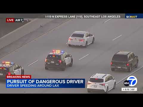 LAPD chase possibly armed suspects through downtown L.A.