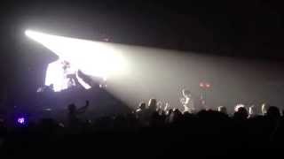 Joowon in White suit singing Innocente