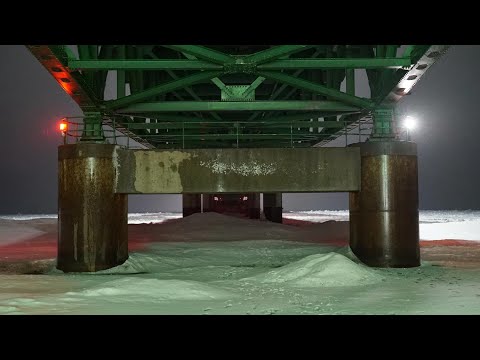 Mackinac Bridge Area On A Cold And Snowy Night When...