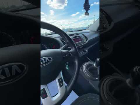 фото kia sportage iii 0