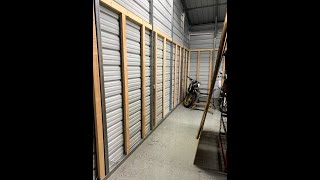 Installing 2x4 studs in a metal building. Building my dream motorcycle shop Episode 3.