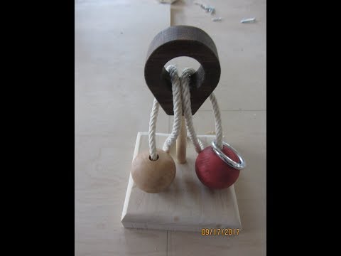 Wood Ball - Metal Ring -  Rope Puzzle