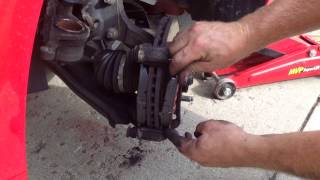 Changing the front brake pads on a 2008 Suzuki Reno