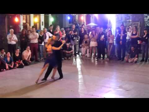  Javier Rodriguez  and  Noelia Barsi  are  dancing  to  the  tango  "  Nada Mas  "  by  Juan D'Arienzo  at  Festival de San Telmo  in  2014
