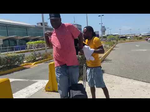Big Wayne get Rob right at the airport in Jamaica  Tek  weh I'm money bag ankle socks