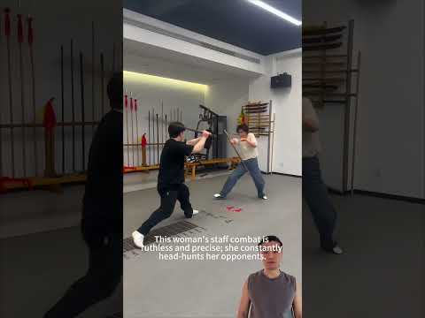 This woman’s staff combat is ruthless and precise; she constantly head hunts her opponents#fighting