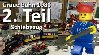 Schiebezug 7710 mit 4,5 V Motor und Beleuchtung als 2. Teil der Grauen LEGO® Eisenbahn von 1980