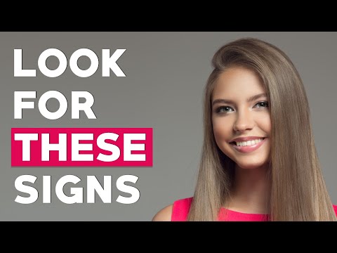 9 Body Language Signs She's Attracted to You