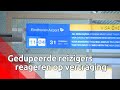Passagiers reageren op vertragingen op Eindhoven Airport