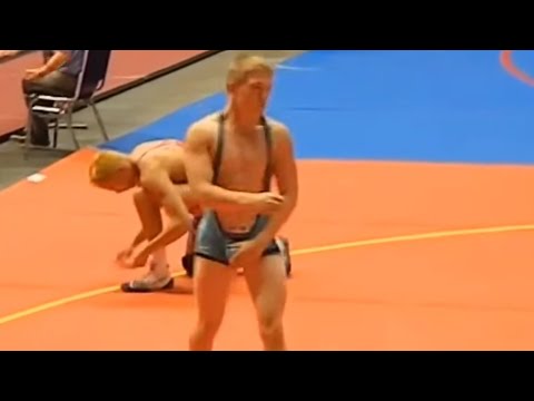 Wrestling in a low cut singlet