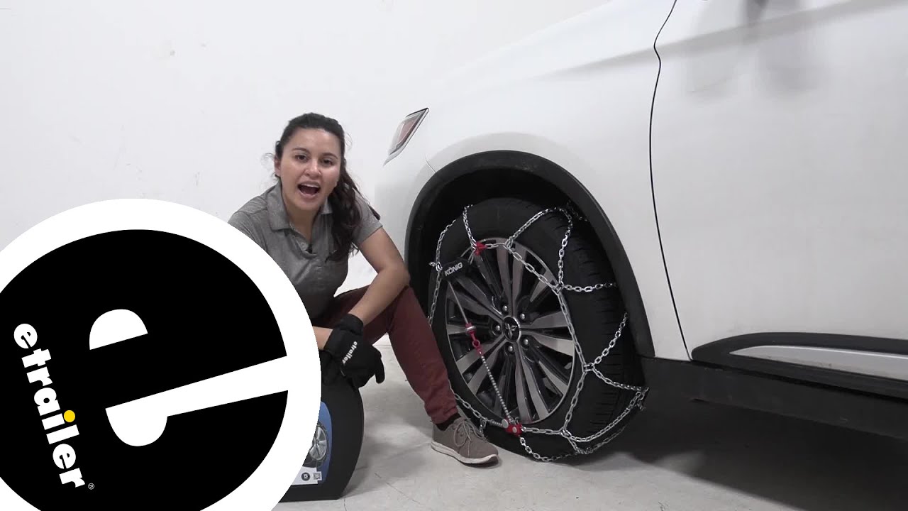 Watch video etrailer | Konig Self-Tensioning Snow Tire Chains Installation - 2020 Mitsubishi Outlander Now etrailer | Konig Self-Tensioning Snow Tire Chains Installation - 2020 Mitsubishi Outlander