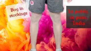 Boy in stockings in public