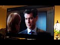 Die Another Day 2002 Film James Bond Kisses Moneypenny In The MI6 Headquarters In London