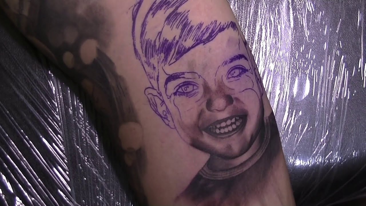 tattoo of a realistic child face by florin zaharia