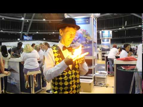 Trevor Duffy entertains people with a magic trick
