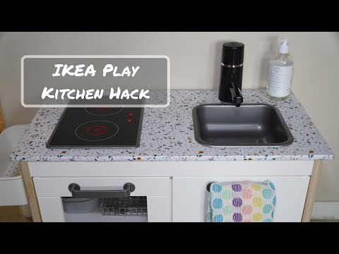 Part of a video titled Montessori Functional Kitchen| IKEA Play Kitchen Hack Working Sink