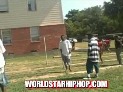 Total Mayhem In The Projects: Dudes Fighting Chick With Tree Branches